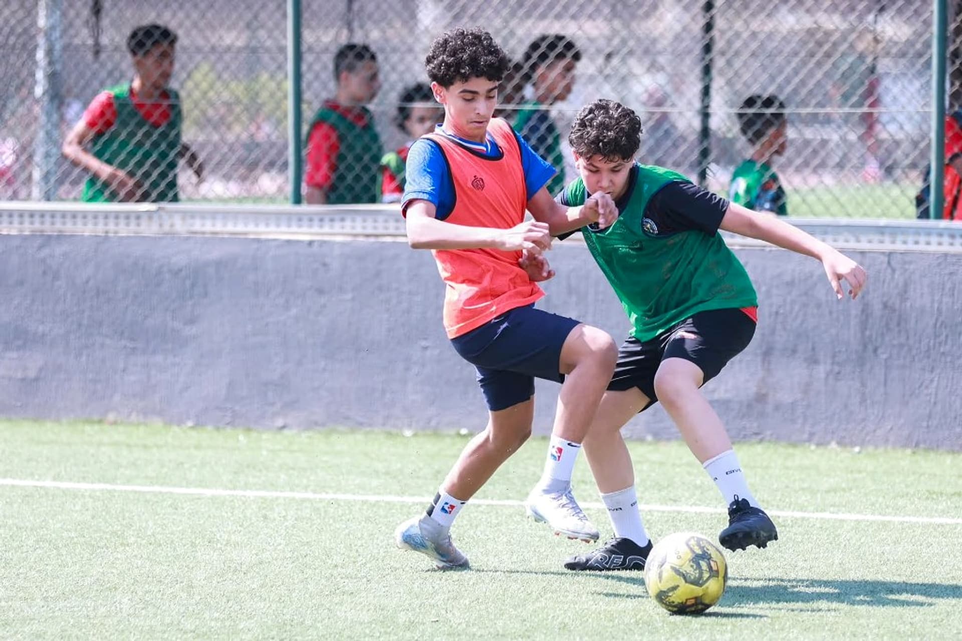 Two young players in a competitive duel